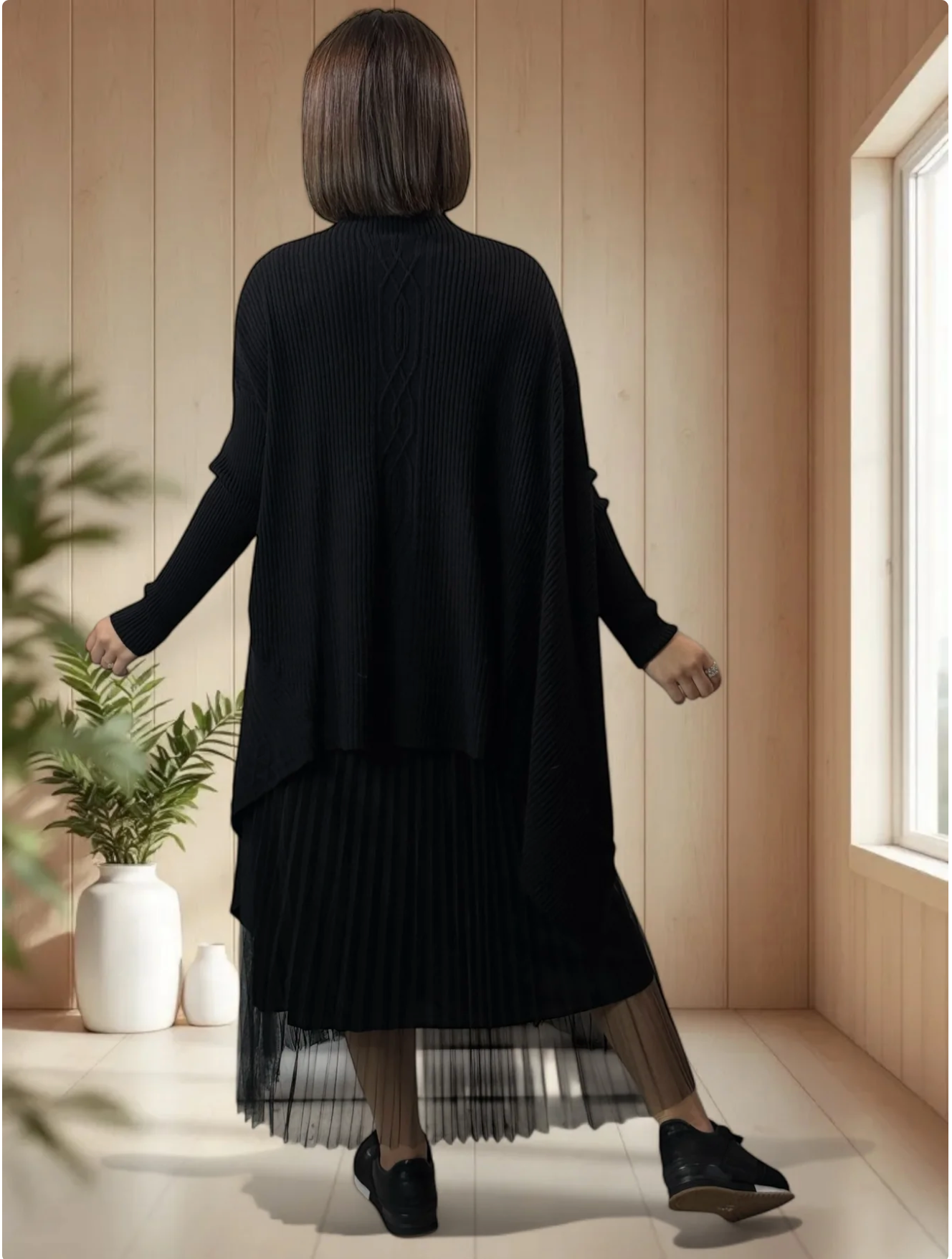 ALICE- PULL NOIR ASYMETRIQUE JUSQU'A LA TAILLE 50/52