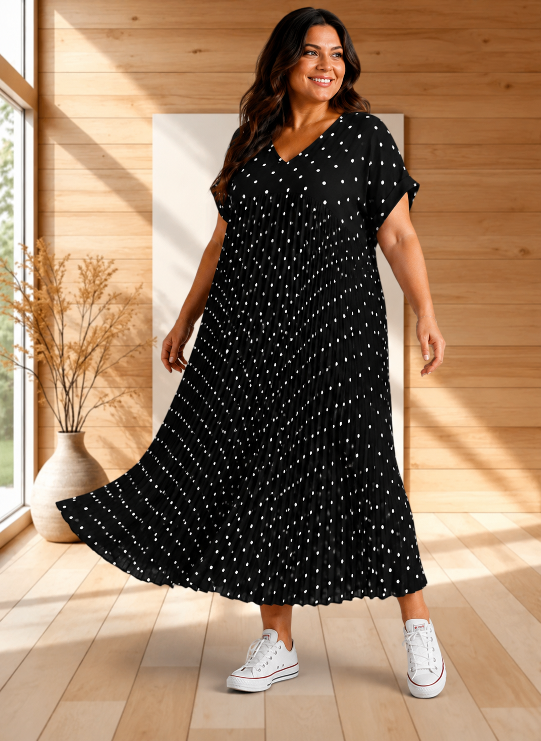 MELODIE - ROBE NOIRE A POIS PLISSEE JUSQU'A LA TAILLE 56