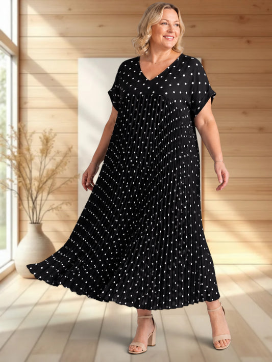 MELODIE - ROBE NOIRE A POIS PLISSEE JUSQU'A LA TAILLE 56