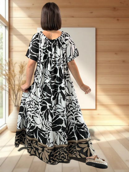 FANNY - ROBE LONGUE FLUIDE A MOTIF NOIR JUSQU'A LA TAILLE 52