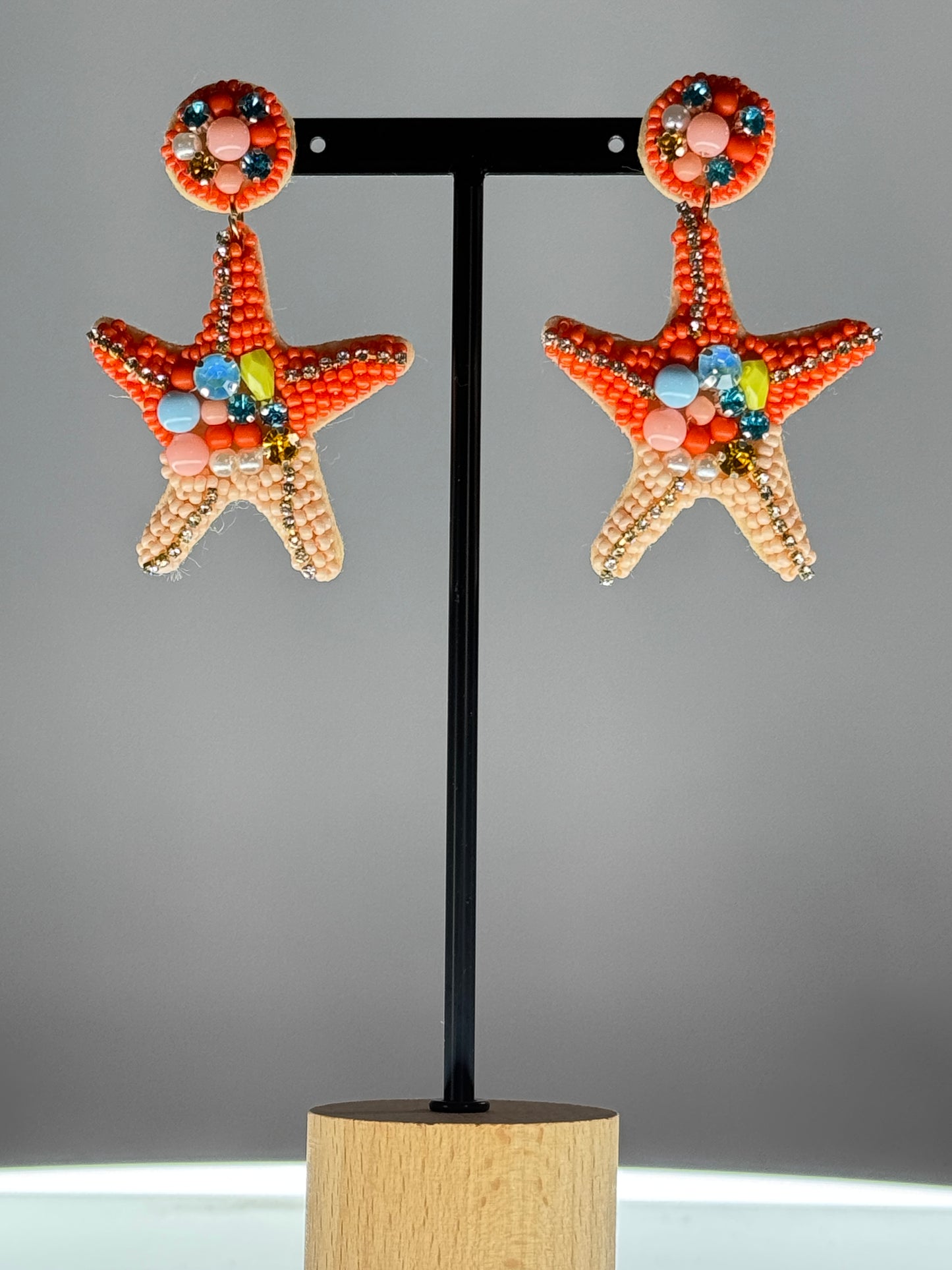 BOUCLES D'OREILLES ETOILE DE MER EN PERLE ORANGE