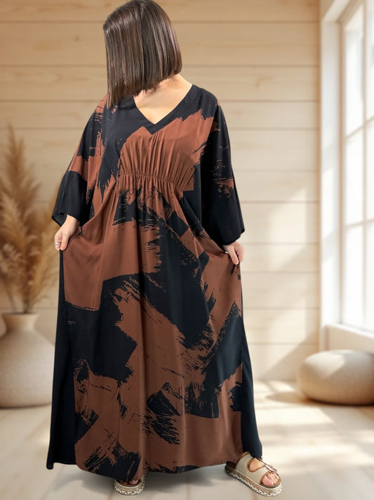 Robe longue ample marron à imprimé animalier - La Fée Maraboutée Robe longue ample marron à imprimé animalier - La Fée Maraboutée
