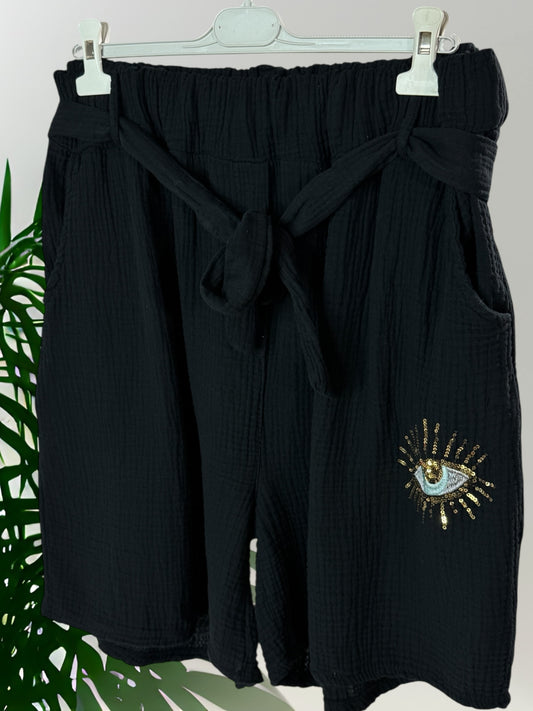 MYKONOS - SHORT NOIR OEIL EN SEQUINS TAILLE 46/48 A 52