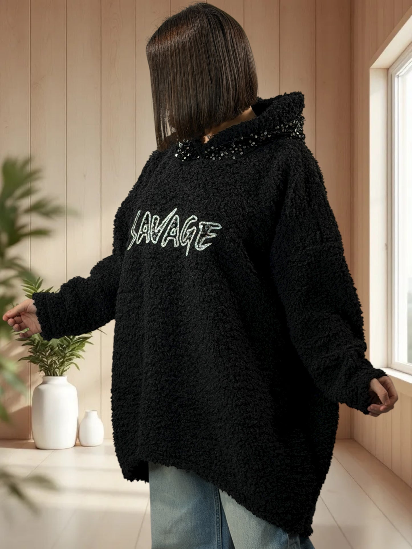 SAVAGE - PULL OVERSIZE NOIR CAPUCHE EN SEQUINS JUSQU'A LA TAILLE 56/58