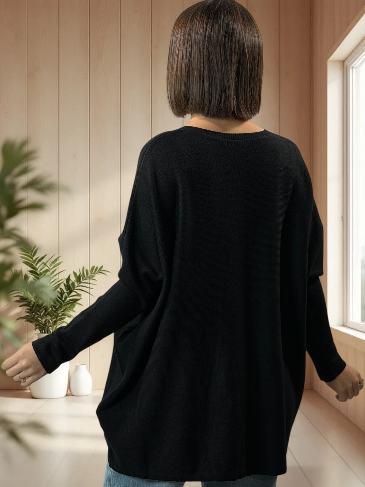 BIANCA - PULL OVERSIZE NOIR AVEC PERLE JUSQU'A LA TAILLE 54/56