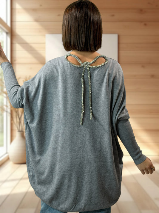ANAIS - PULL GRIS NOEUD EN STRASS DANS LE DOS JUSQU'A LA TAILLE 52/54